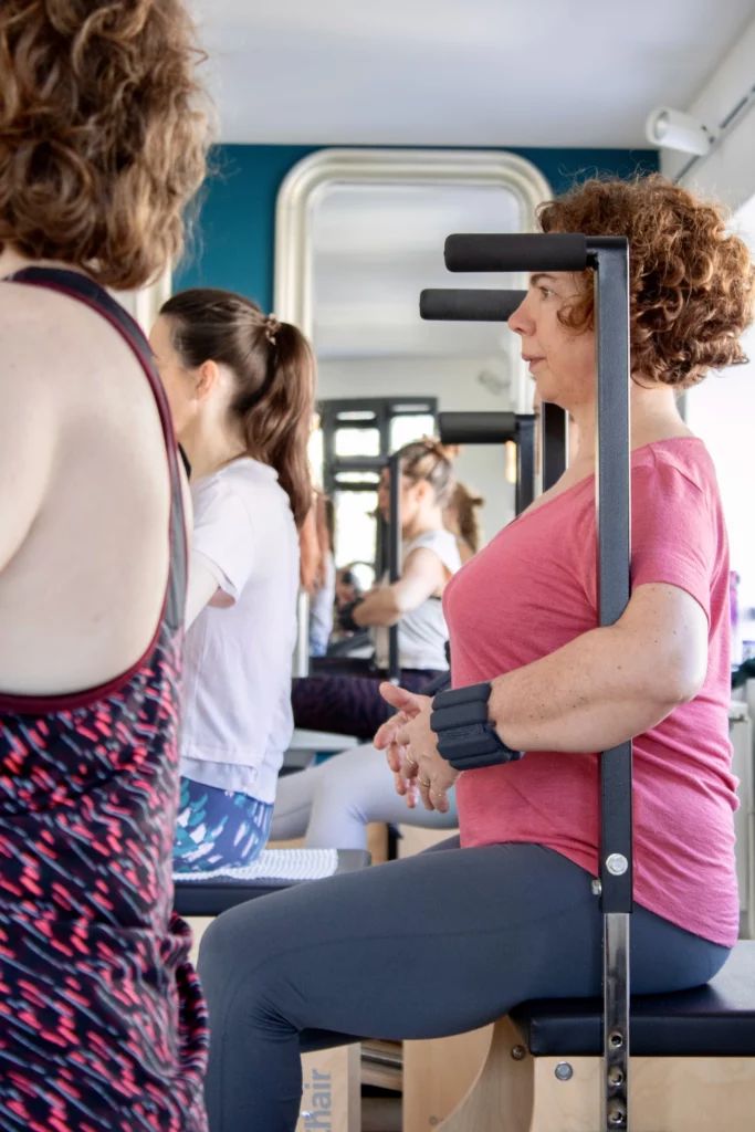 cours de pilates d'une cliente